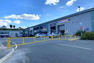 8 metre wide Yellow strong big swing Gate at the entrance of Industrial Trade Park.